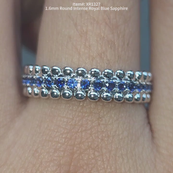 DovEggs blue sapphire wedding band sparkling in sunlight video