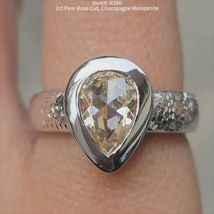 DovEggs pear rose cut champagne moissanite bezel engagement ring