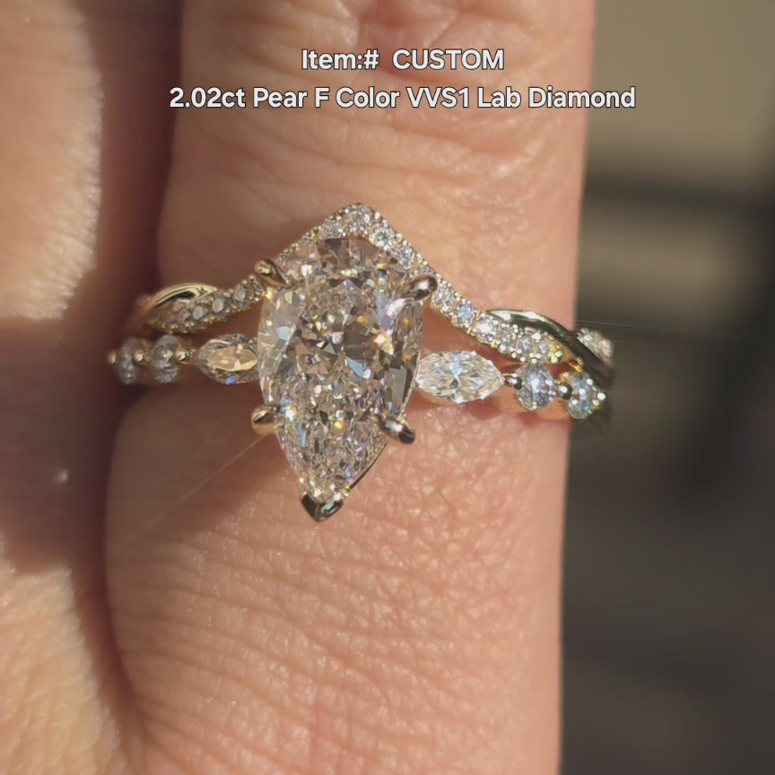 DovEggs 2.02ct pear lab diamond pave engagement ring in sunlight