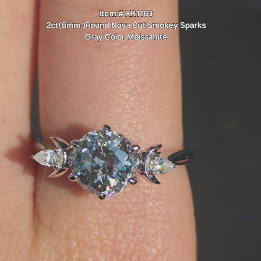 DovEggs Round Nova cut smokey sparks grey moissanite ring sparkling in sunlight video.