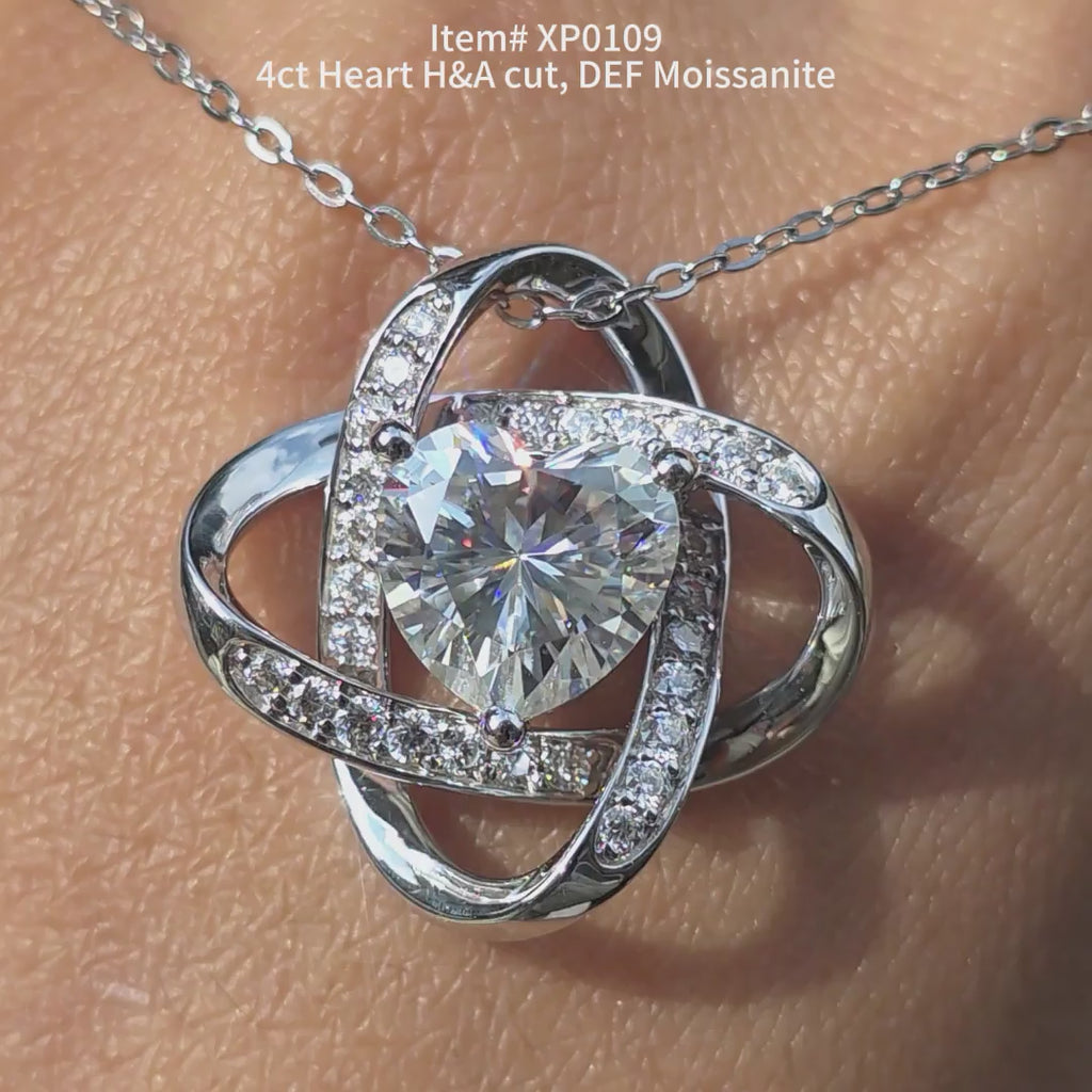  DovEggs heart moissanite pendant sparkling in sunlight video