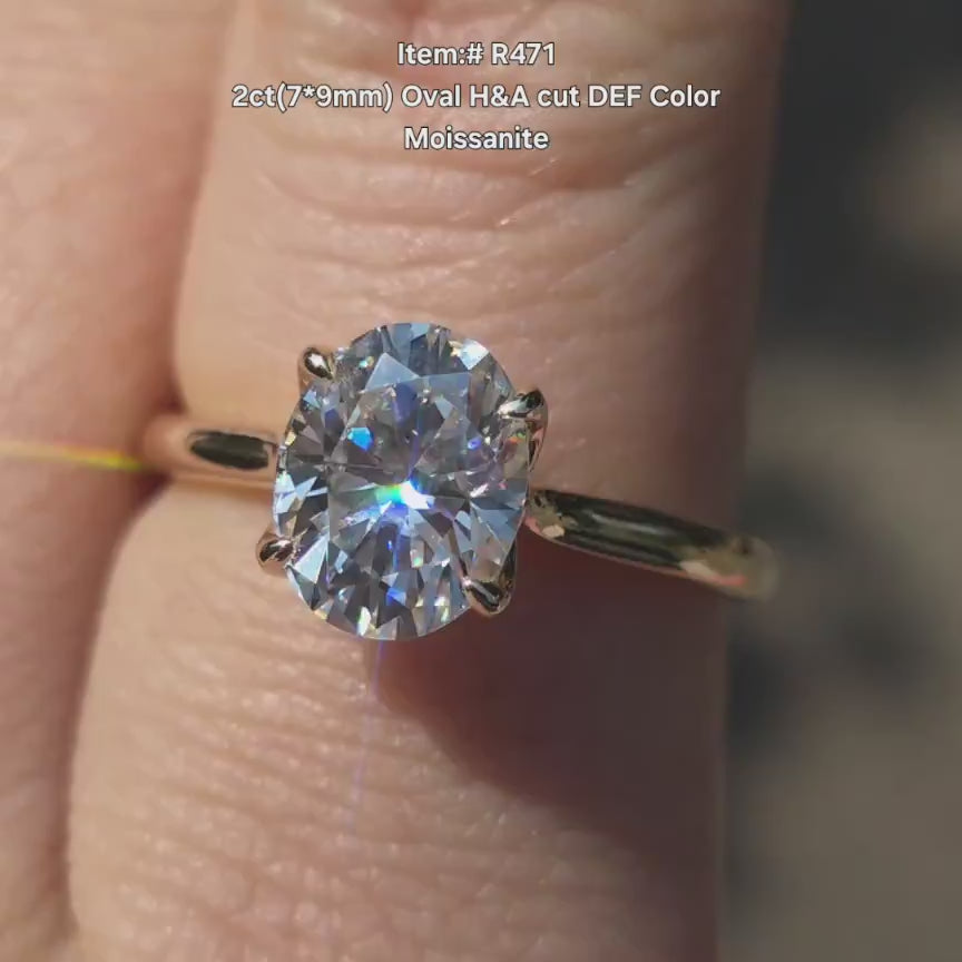 DovEggs Oval solitaire moissanite engagement ring in sunlight