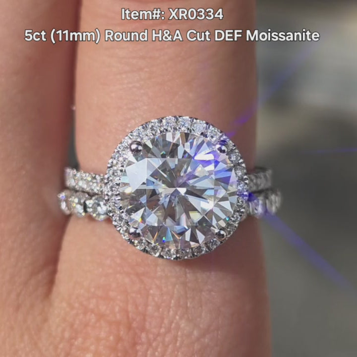 DovEggs 5ct Round H&A cut moissanite ring sparkling in sunlight video.