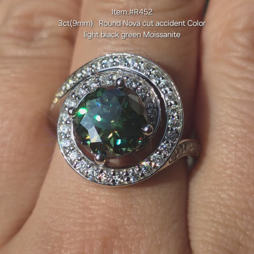 DovEggs 3ct Round Nova cut green moissanite ring sparkling in sunlight video.