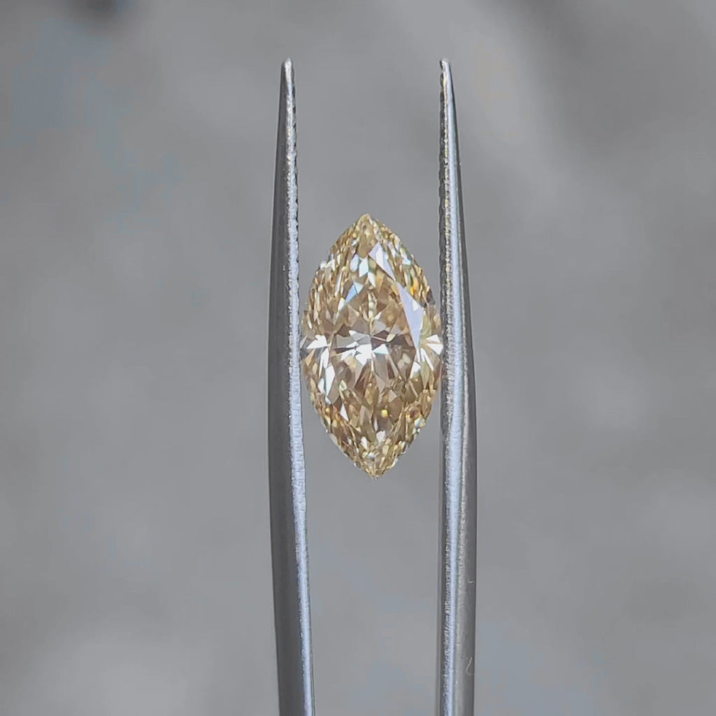 Sunlight video highlighting 3.260ct marquise diamond's yellow saturation