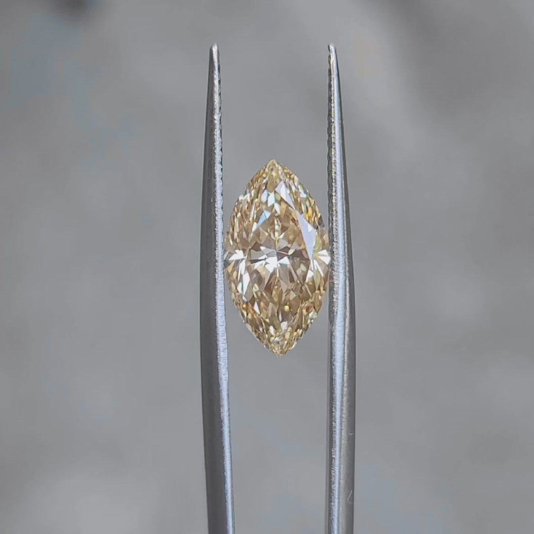 Sunlight video highlighting 3.260ct marquise diamond's yellow saturation