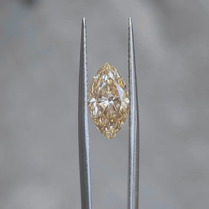 Sunlight video highlighting 3.260ct marquise diamond's yellow saturation