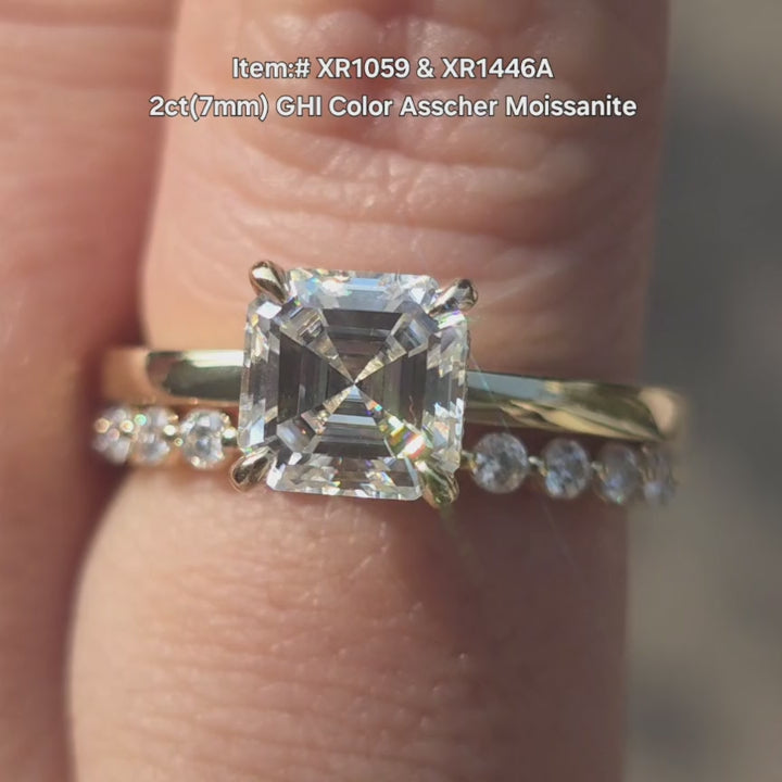 DovEggs 2ct Asscher moissanite engagement ring with claw prongs sparkling in sunlight video.