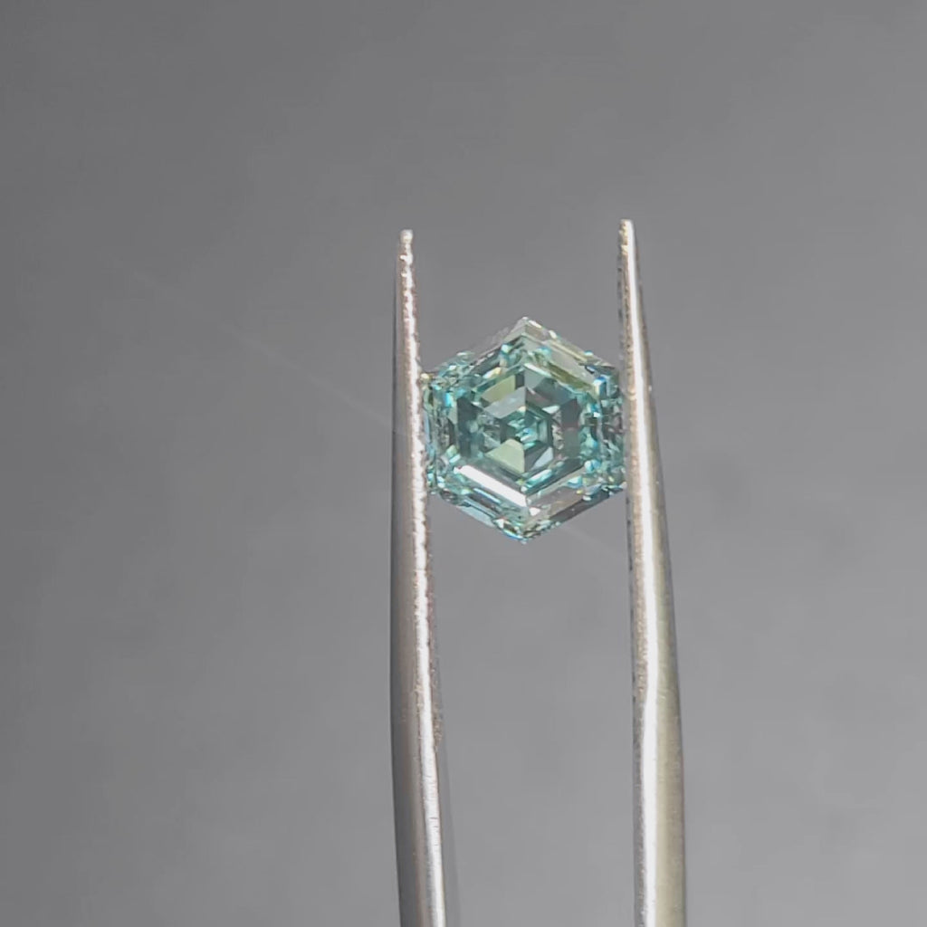 Sunlight video showing 2.494ct hexagon diamond's unique shape and green hue