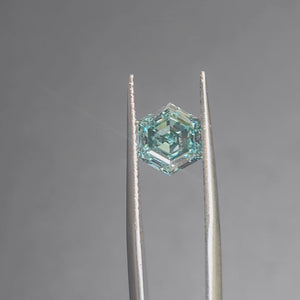 Sunlight video showing 2.494ct hexagon diamond's unique shape and green hue