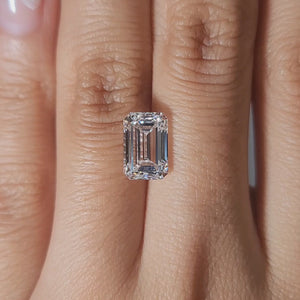 Elegant video of 3.06ct emerald diamond in warm lighting