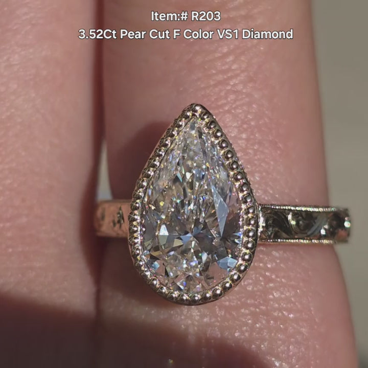 DovEggs pear cut lab grown diamond ring sparkling in sunlight video.