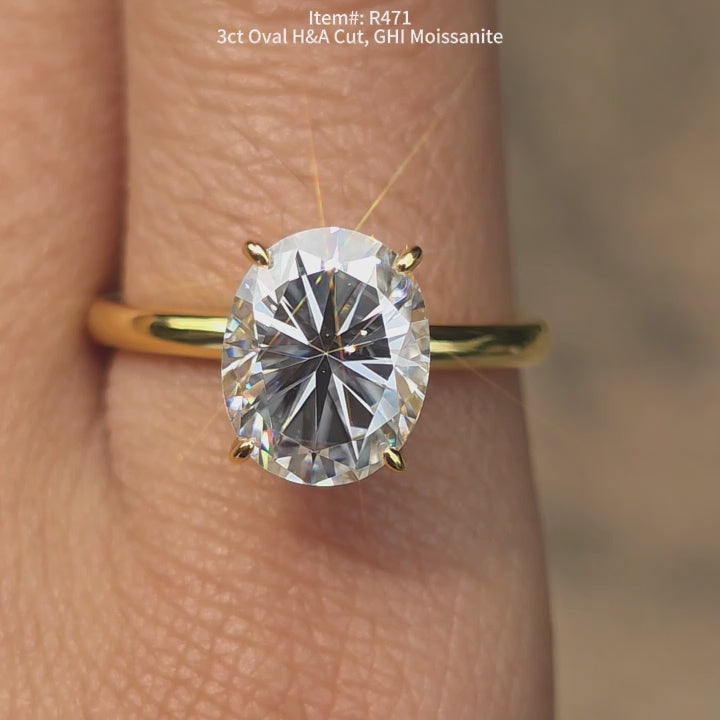 DovEggs 3ct Oval H&A cut GHI color moissanite ring sparkling in sunlight video.
