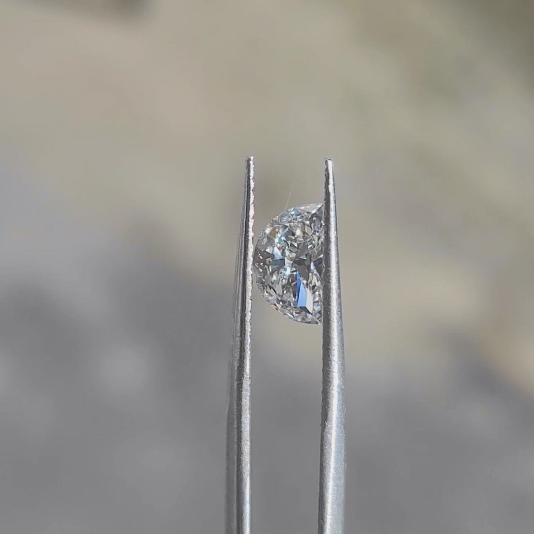 Sunlight video showcasing 1.044ct half-moon diamond's unique silhouette