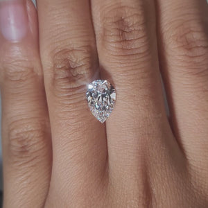Necklace-display video of 2.166ct pear diamond in warm light