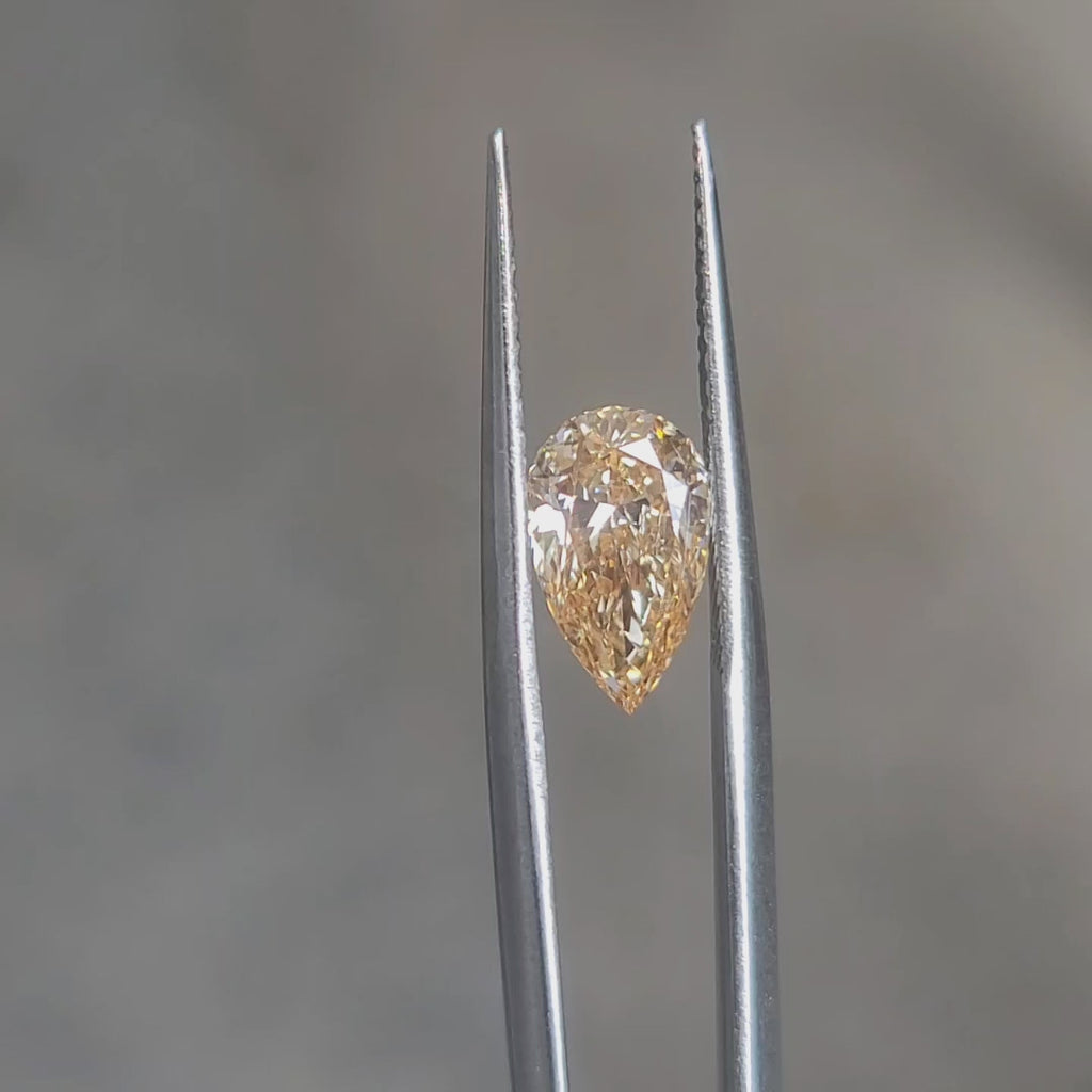 Unique angle video of 2.090ct pear's fancy orange hue