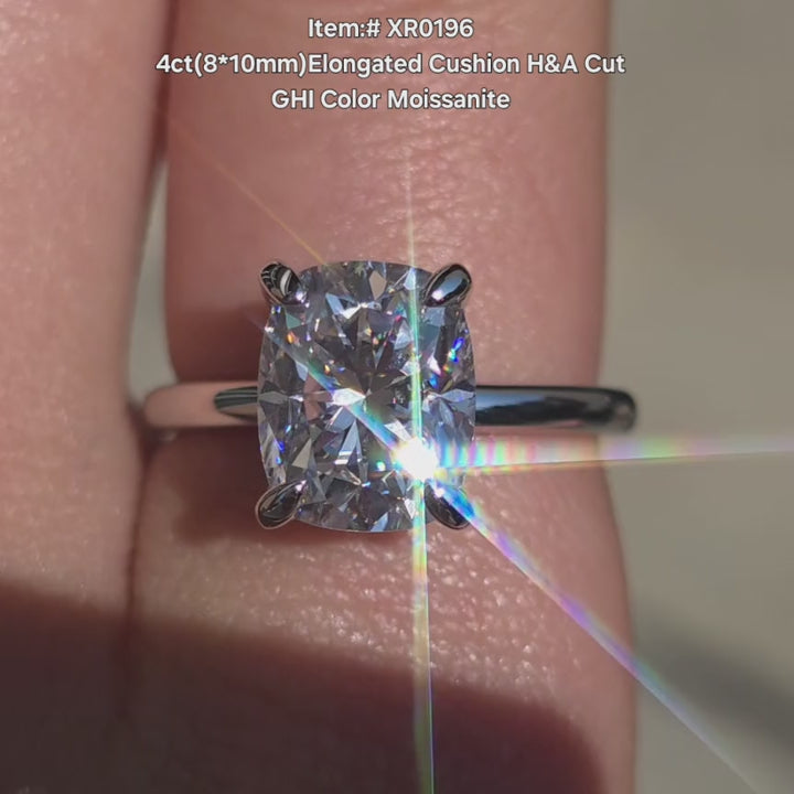 DovEggs Elongated cushion cut moissanite ring sparkling in sunlight video.