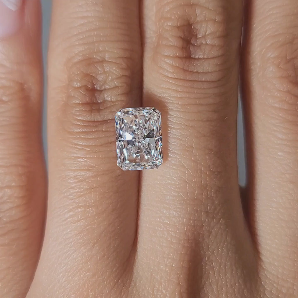 Hand-worn video of 3.03ct radiant diamond in warm glow