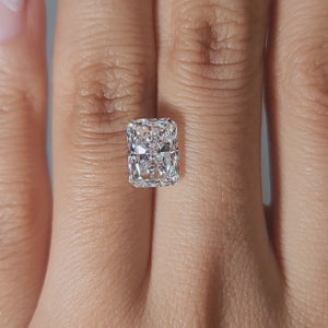 Hand-worn video of 3.03ct radiant diamond in warm glow