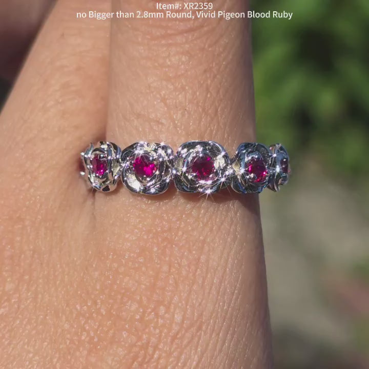 DovEggs feminine and rose floral vintage half etenity vivid pigeon blood ruby sapphire ring under sunlight