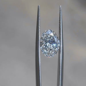 Outdoor sparkle video of 3.18ct oval G color VS2 diamond