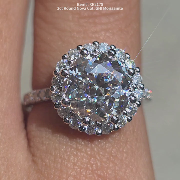  DovEggs 3ct Round Nova cut moissanite engagement ring sparkling in sunlight video.