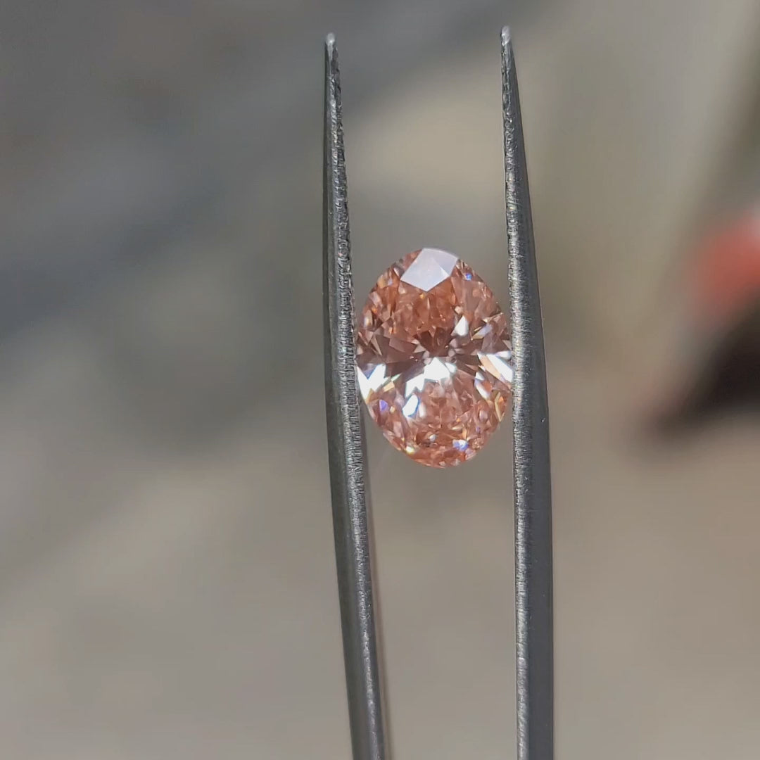 3.17ct Oval pink diamond’s vivid sparkle enhanced by outdoor light