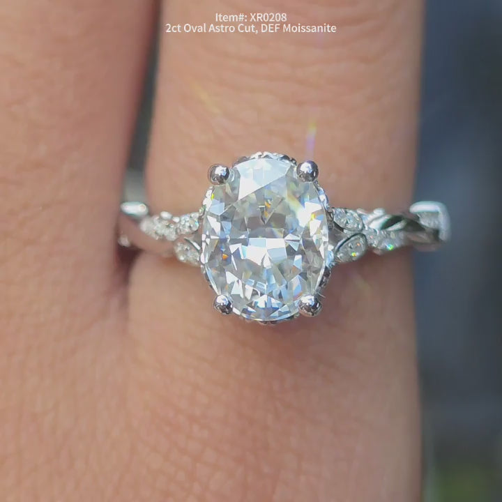 DovEggs DEF color Astro oval  moissanite ring sparkling in sunlight video.