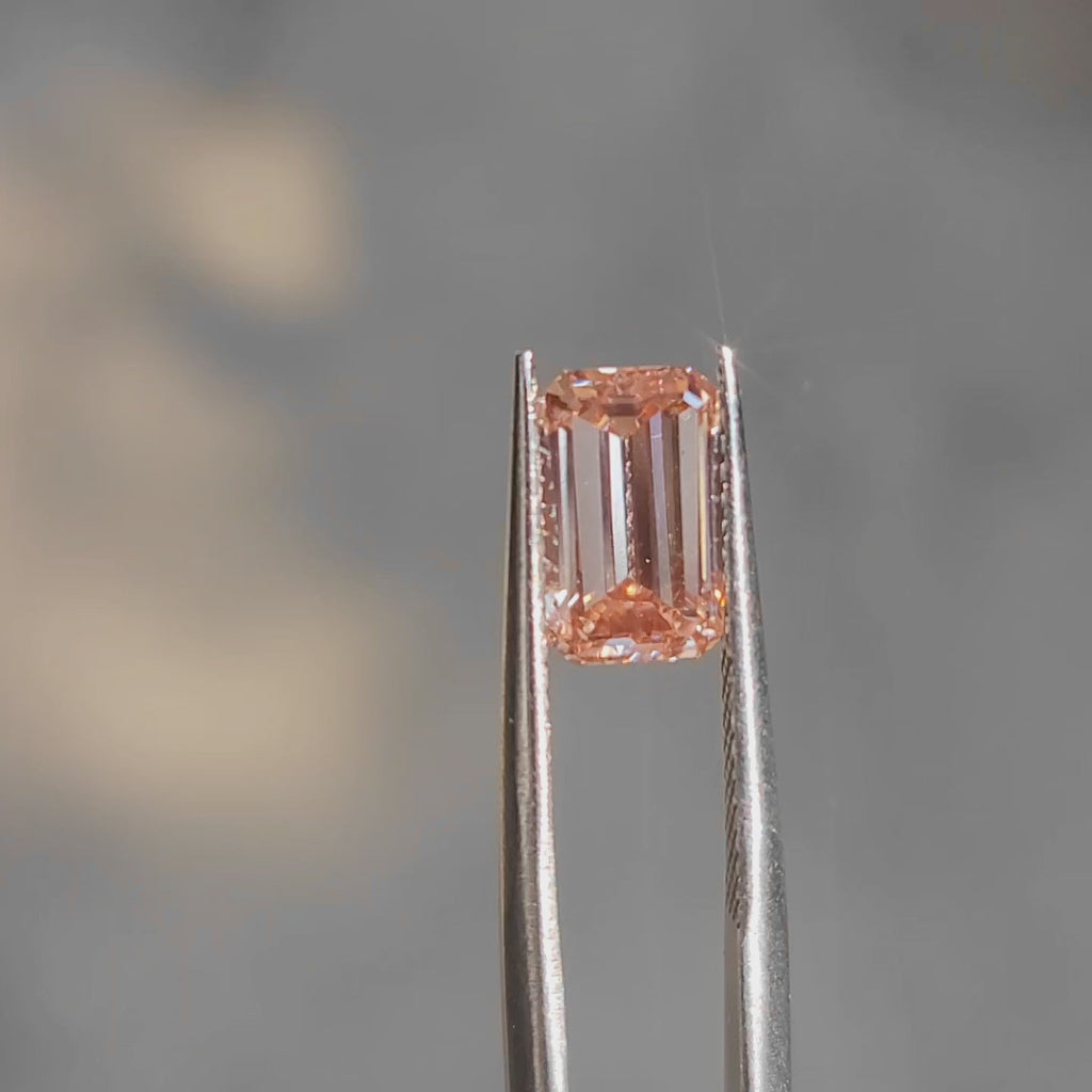 Outdoor video showing emerald cut's 'hall of mirrors' effect in pink