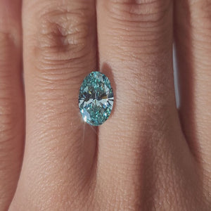 Close-up video of 2.002ct blue diamond rotating in diffused light