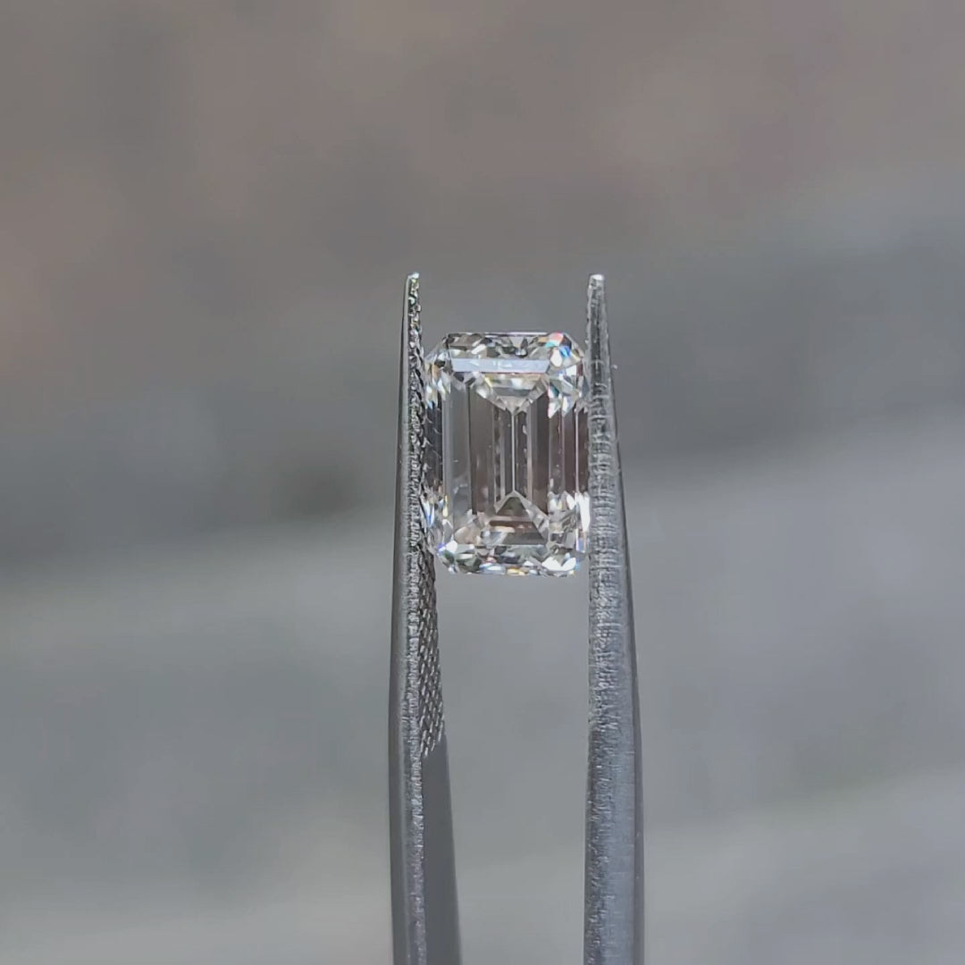 3.17ct emerald cut F color diamond video showing near-colorless clarity outdoors