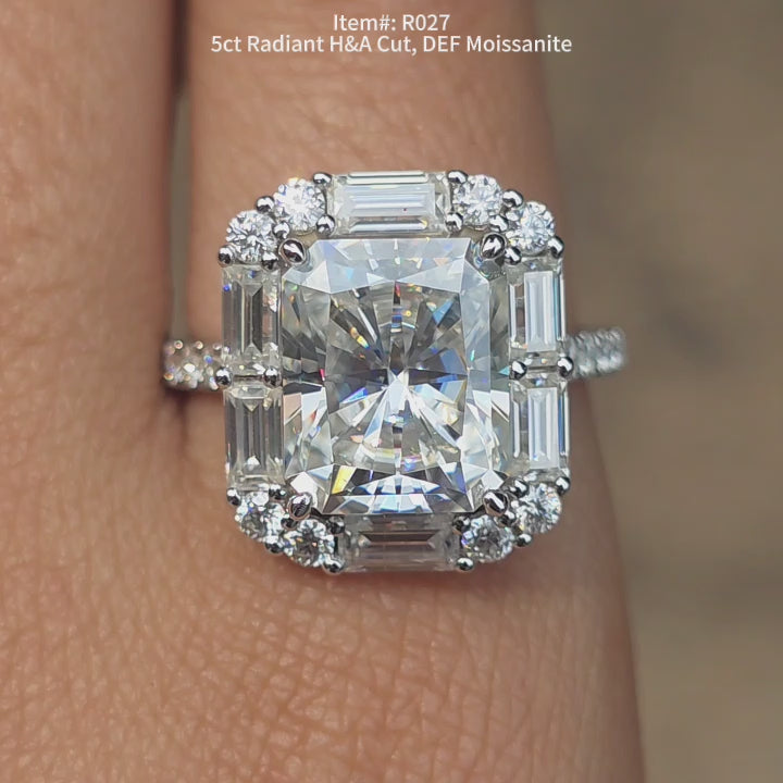 DovEggs 5ct Radiant Hearts & Arrows cut DEF color moissanite ring sparkling in sunlight video.