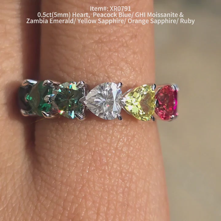DovEggs heart colored gemstones peacock and GHI color moissanite wedding band sparkling in sunlight video