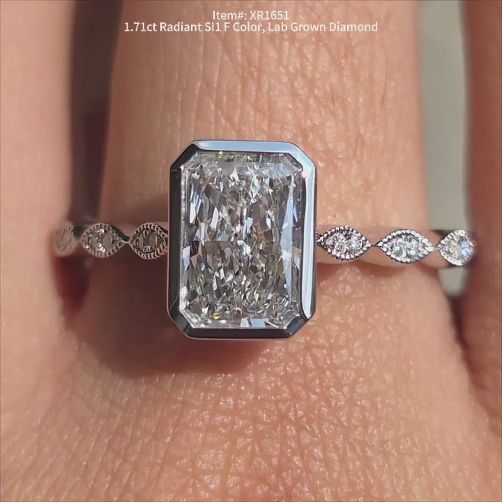 DovEggs 1.71ct Radiant lab grown diamond engagement ring sparkling on hand video.