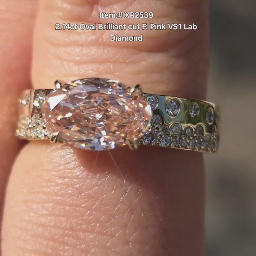 DovEggs oval pink lab diamond engagement ring in sunlight shinning