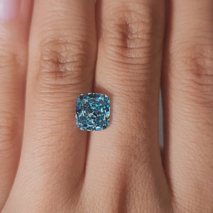 "Hand-modeled video showcasing 2.18ct bluish green cushion diamond"