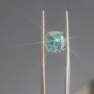 Sunlight video of 2.362ct cushion cut's brilliant blue sparkle and faceting