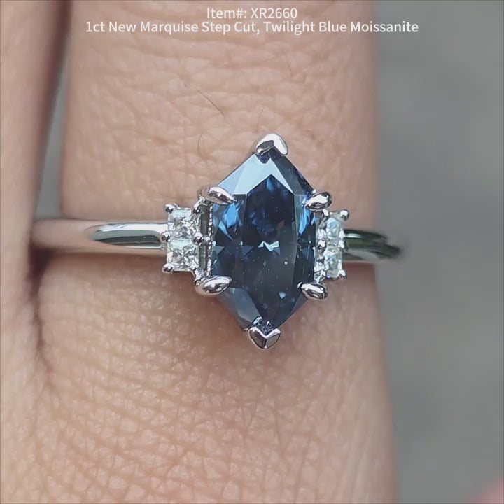 DovEggs Twlight blue Marquise step cut moissanite ring sparkling in sunlight video