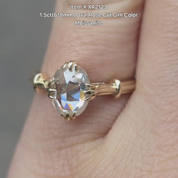 DovEggs 1.5ct oval rose cut moissanite ring sparkling in sunlight video.