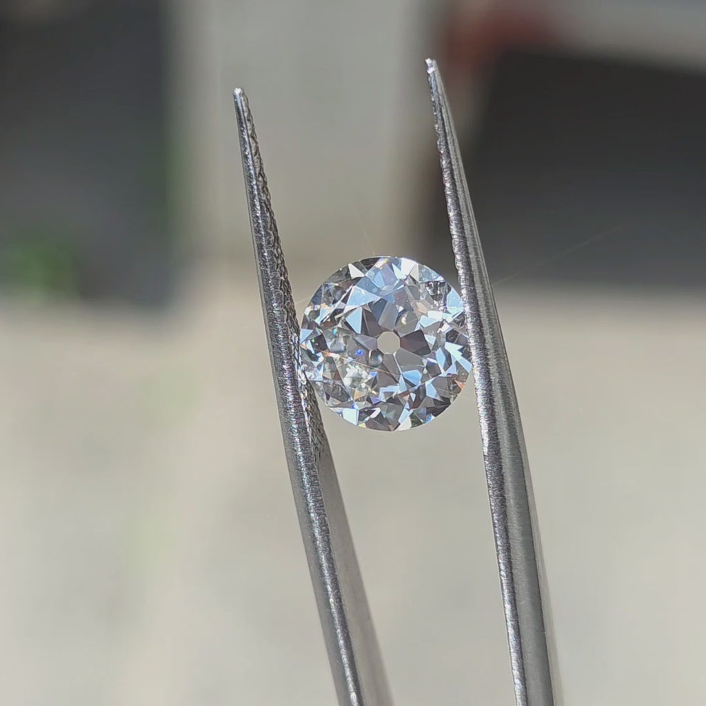 The unique sparkle of a 3.02ct round European cut lab diamond in sunlight.