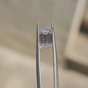 Top-down view of 2.51ct emerald cut lab diamond's clarity characteristics