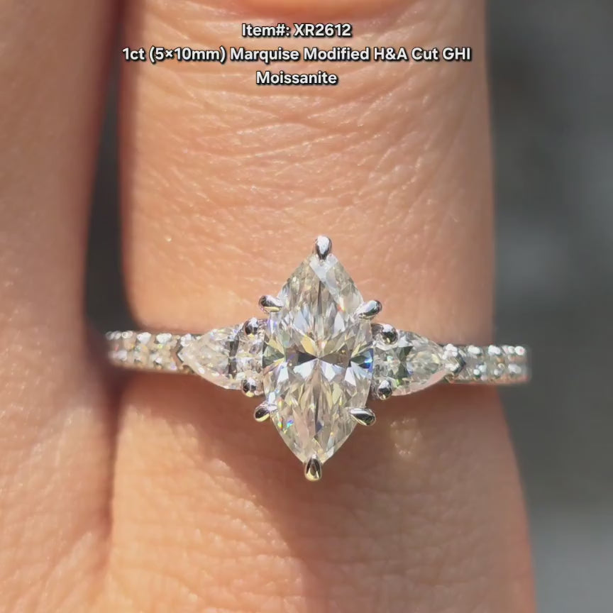 DovEggs Marquise side stones pave moissanite engagement ring video in sunlight