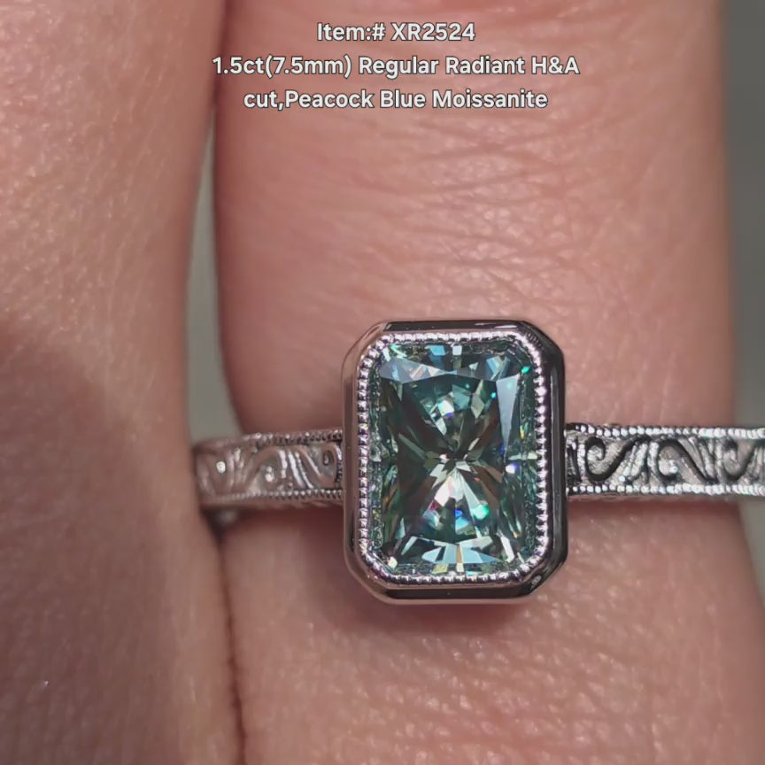 DovEggs Radiant peacock blue moissanite ring sparkling in sunlight video