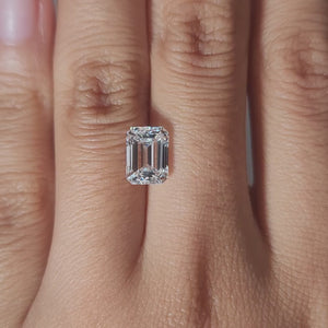Hand-modeled video of 2.26ct D color emerald cut diamond indoors