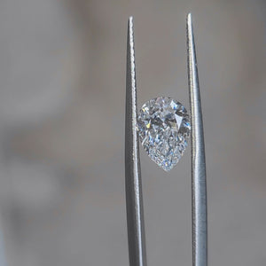 Outdoor video of 1.520ct pear cut's D color and teardrop shape