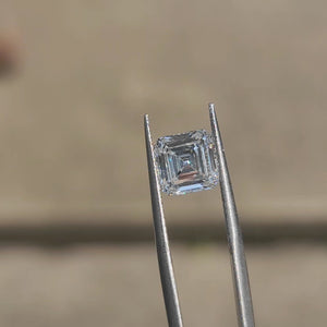 2.54ct Asscher lab diamond (D/VVS1) outdoors, displaying step-cut precision