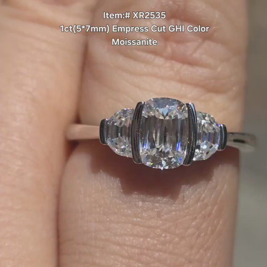 DovEggs three stones empress cut moissanite engagement in sunlight
