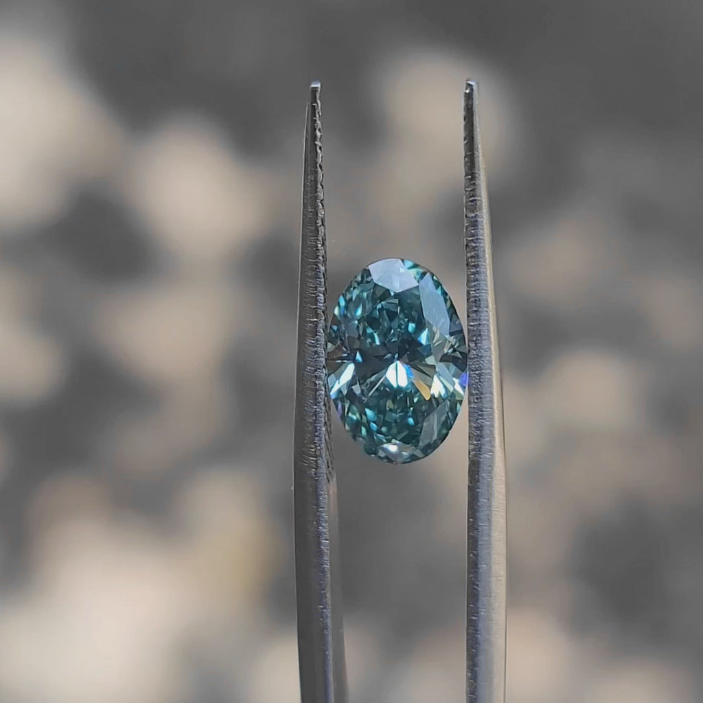 "Sunlight video showing 1.861ct oval cut fancy vivid blue diamond's intense color"