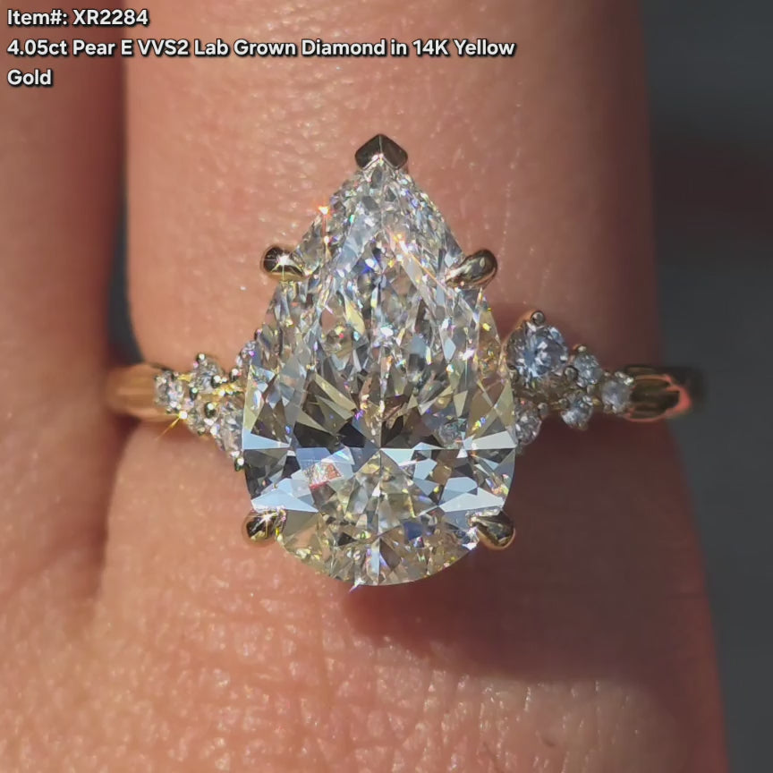 DovEggs pear lab diamond engagement ring sparkling in sunlight video