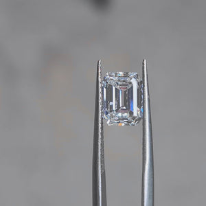 Sunlight video showcasing 3.124ct emerald cut's D color purity and step-cut brilliance
